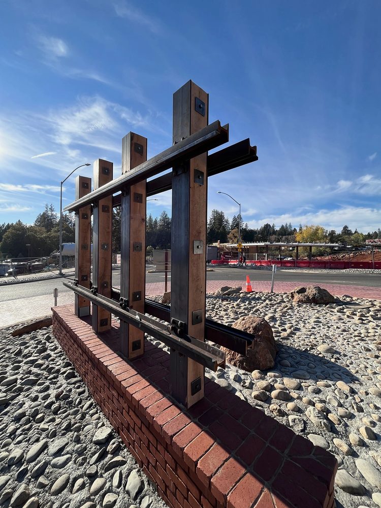 Steel channel frame on posts for an entry monument